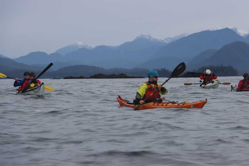 Kayakers in the Adventure Guiding program journey on the water in the North VI region.