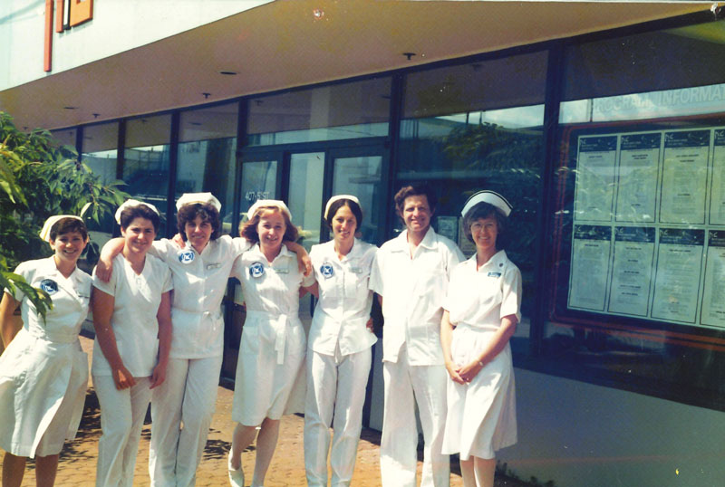 1986 graduates of the nursing program stand together in uniform.