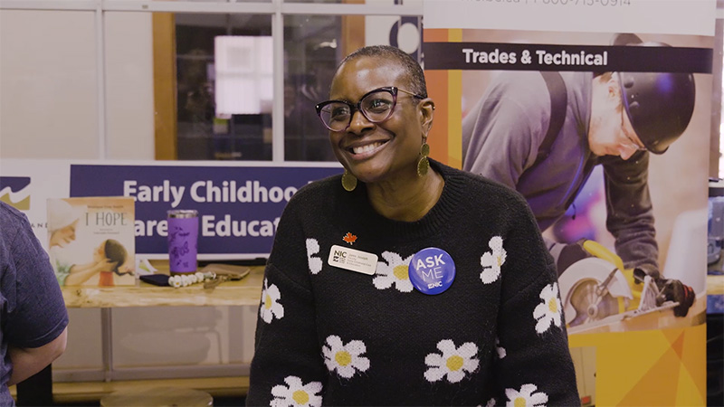 NIC ECCE Faculty member, Janis Joseph talking to an event attendee at NIC Fest Port Alberni