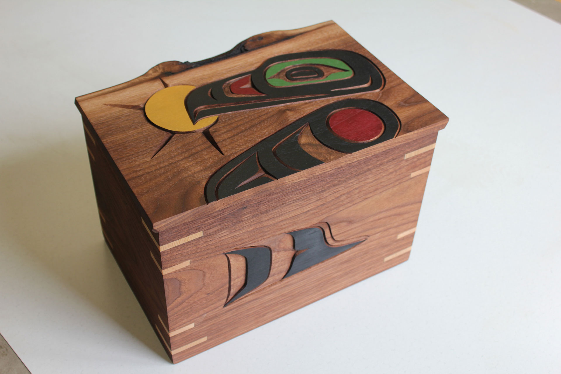 Carved wooden box with Indigenous artwork design