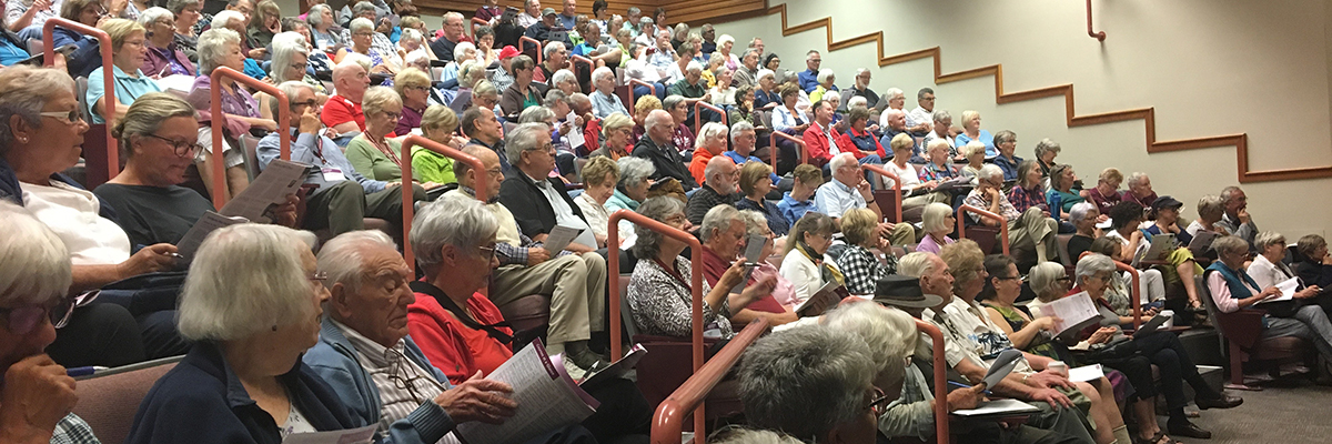 ElderCollege members attend a lecture in NIC’s Stan Hagen Theatre