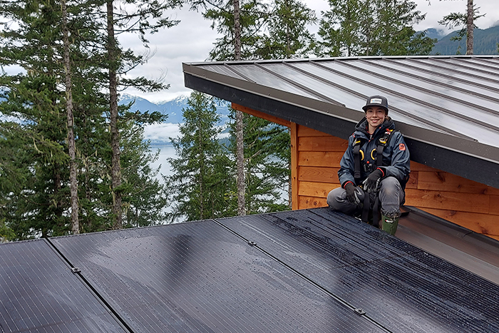 NIC Electrician alum working on renewable...